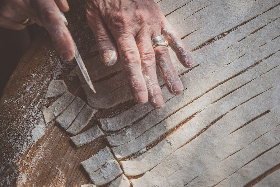 woman making dough at Maggiri facilities
